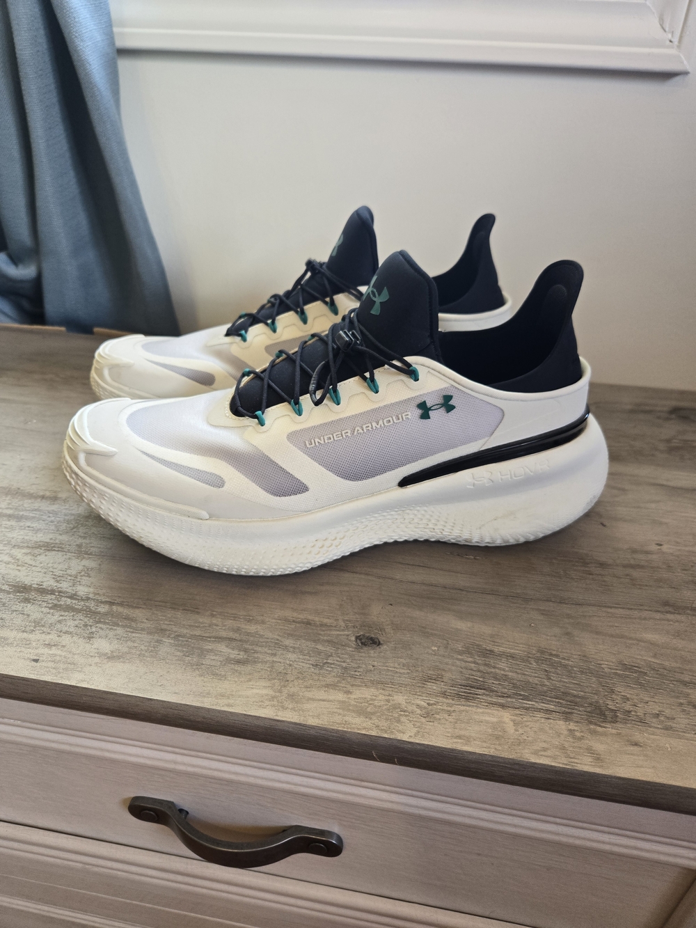 Under Armour White & Black Running Shoes with Teal Accents
